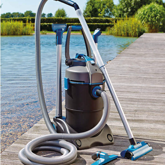 Pool vacuum cleaner on a wooden dock by a body of water